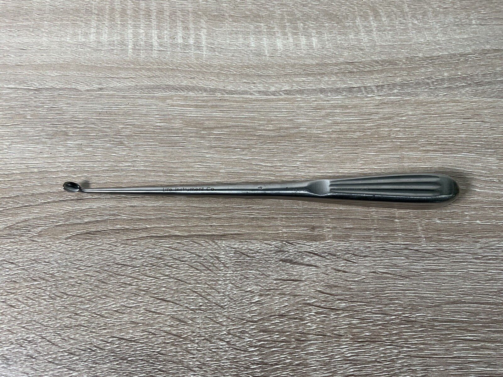 Life Instrument Co. 810-0904-1 Brun Curette, Angled, Size 4