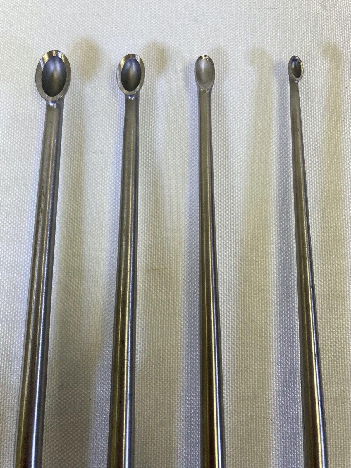 Set of 10 Wallie Heinig Lenox Maclaren 13.5″ Straight & Forward Angled Curettes