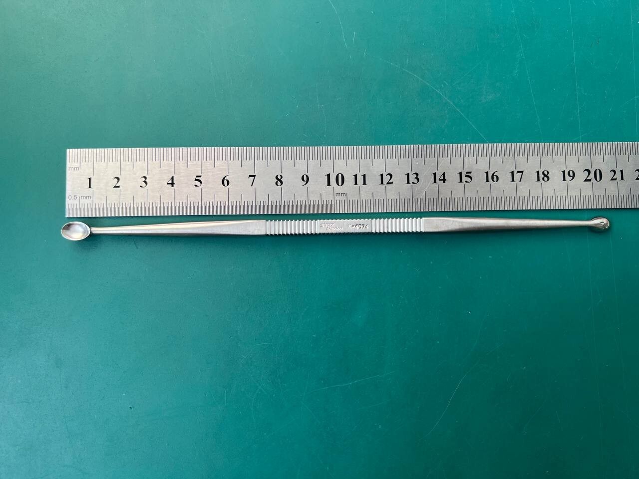 Storz N-4574 Converse curette 8”,double-ended, 6.0mm x 9.0mm and 5.0mm x 8.0mm
