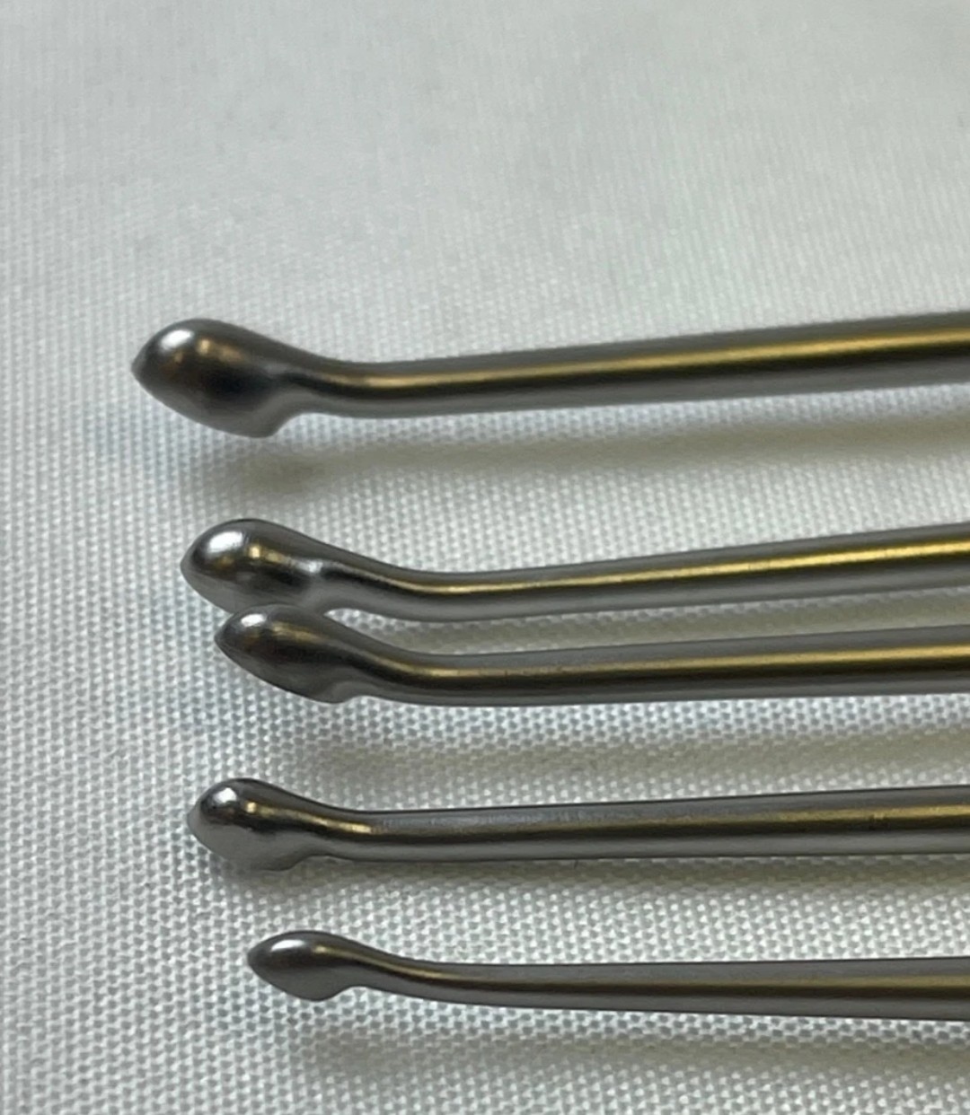 Set of 5 Symmetry Surgical Bruns Hollow Handle Reverse Angle 9″ Curettes 1-0000