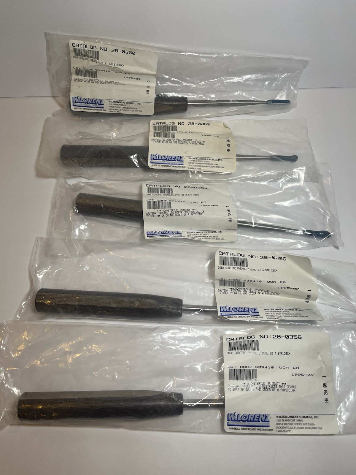 W. Lorenz Cobb Curette Phenolic – Lot Of 5 (28-0350, 28-0352, 28-0354, 28-0356)