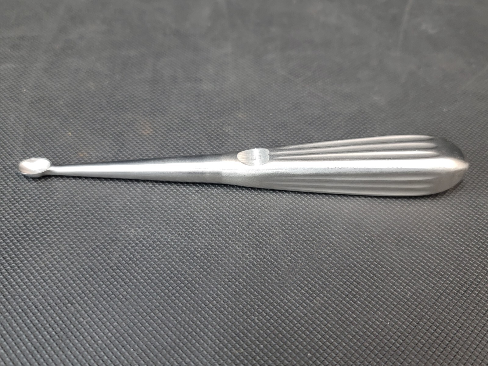 V. Mueller AU6607 Brun Bone Curette 7in Size 5 Oval Cup