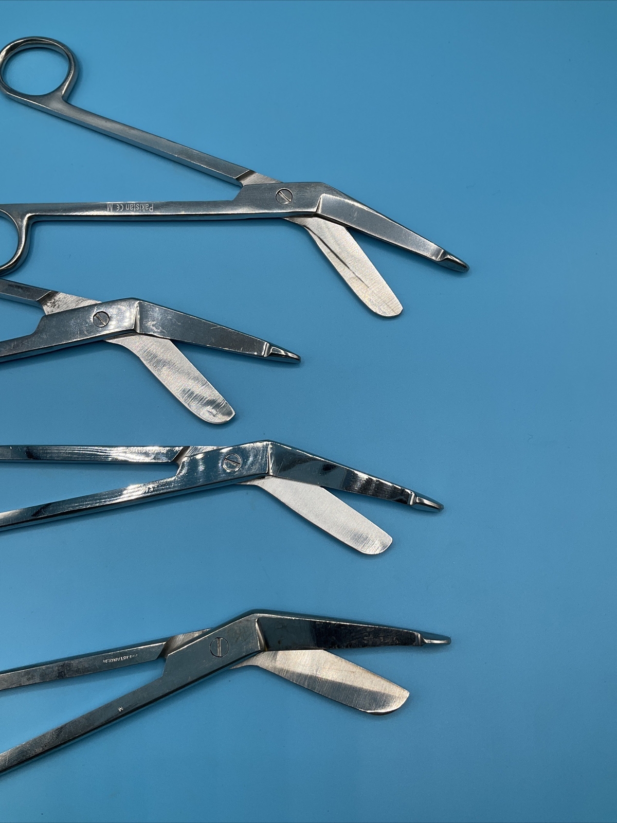 Lot of 4 Pakistan Surgical Plaster and Bandage Shears with Angled Blades