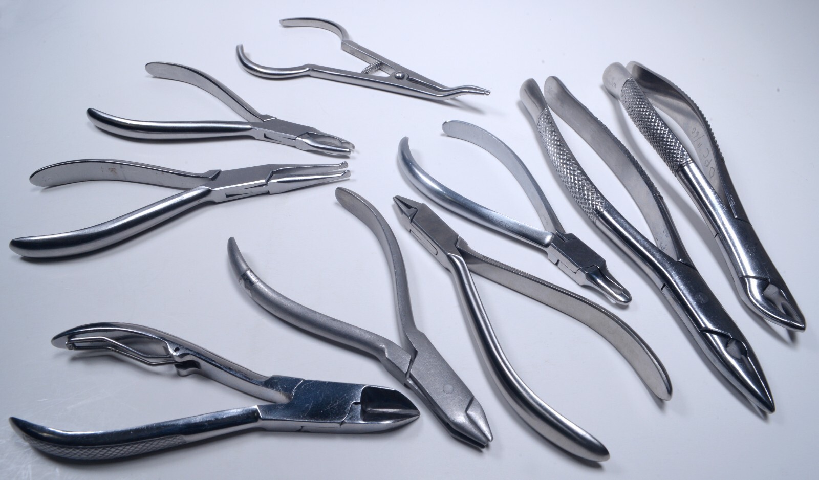 9x Ortodontics Forceps Pliers Extracting Wire Bending Cutting Dental Surgical