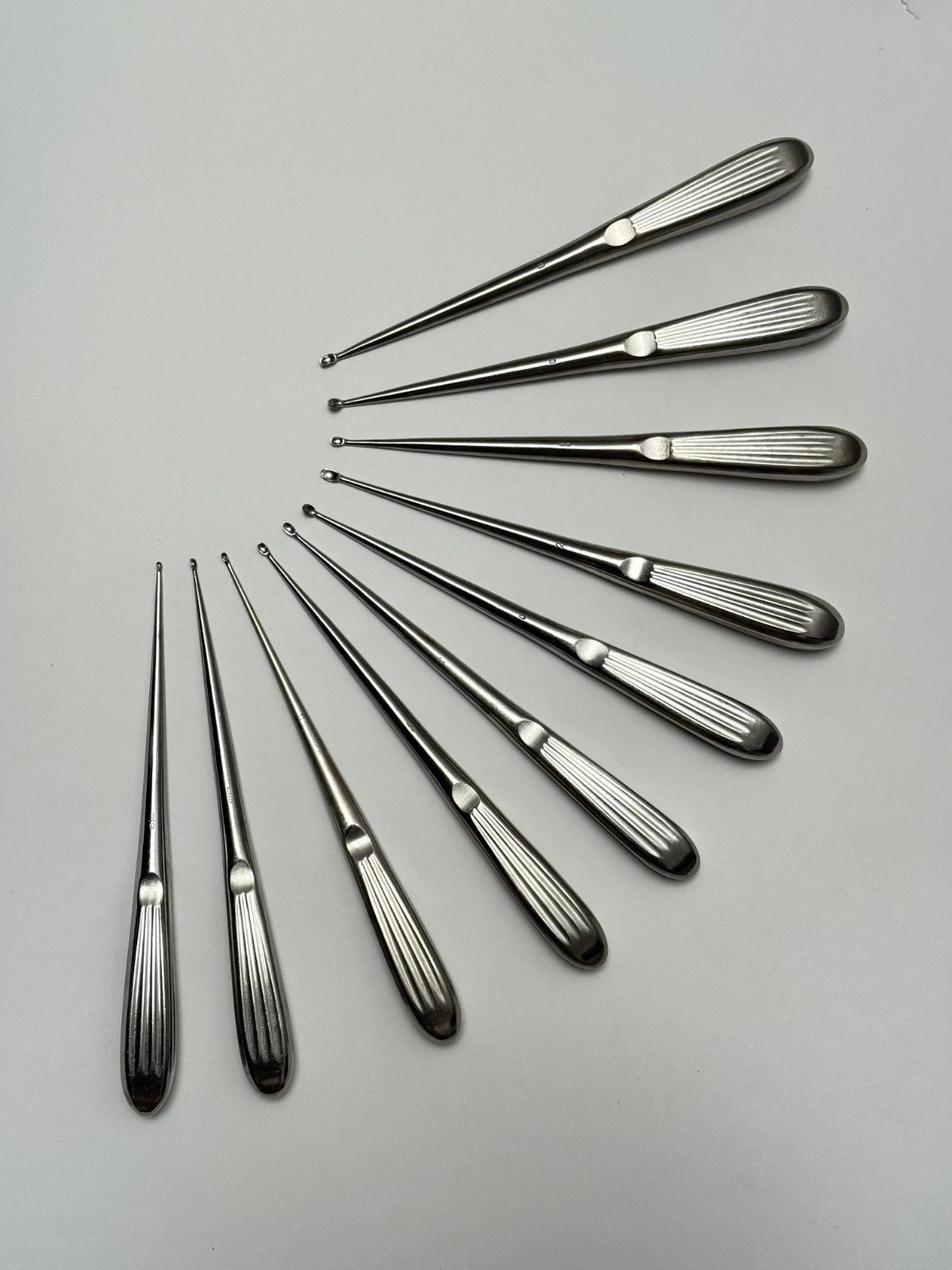 Lot of Aesculap and Symmetry Stainless Steel Bruns Curette