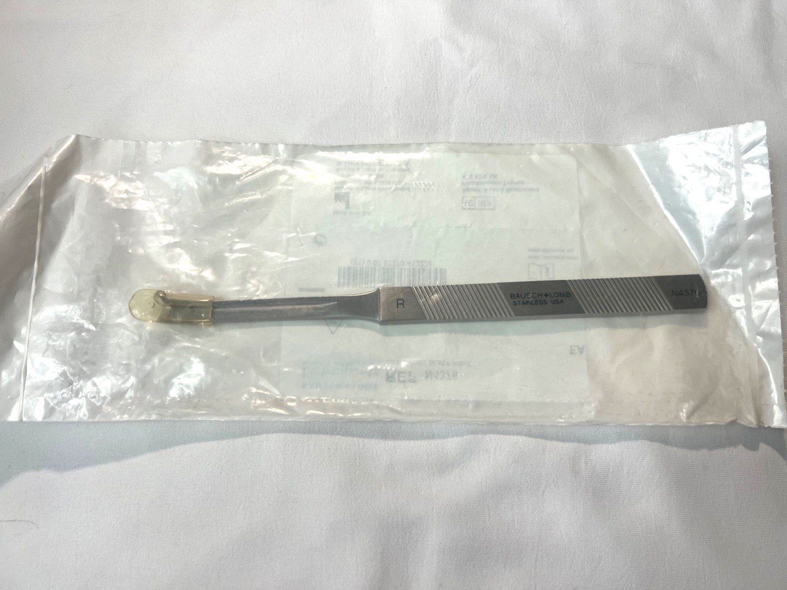 Bausch & Lomb Storz N4376 Silver Osteotome 4mm Curve Right w/ Guard 7.2″ Length