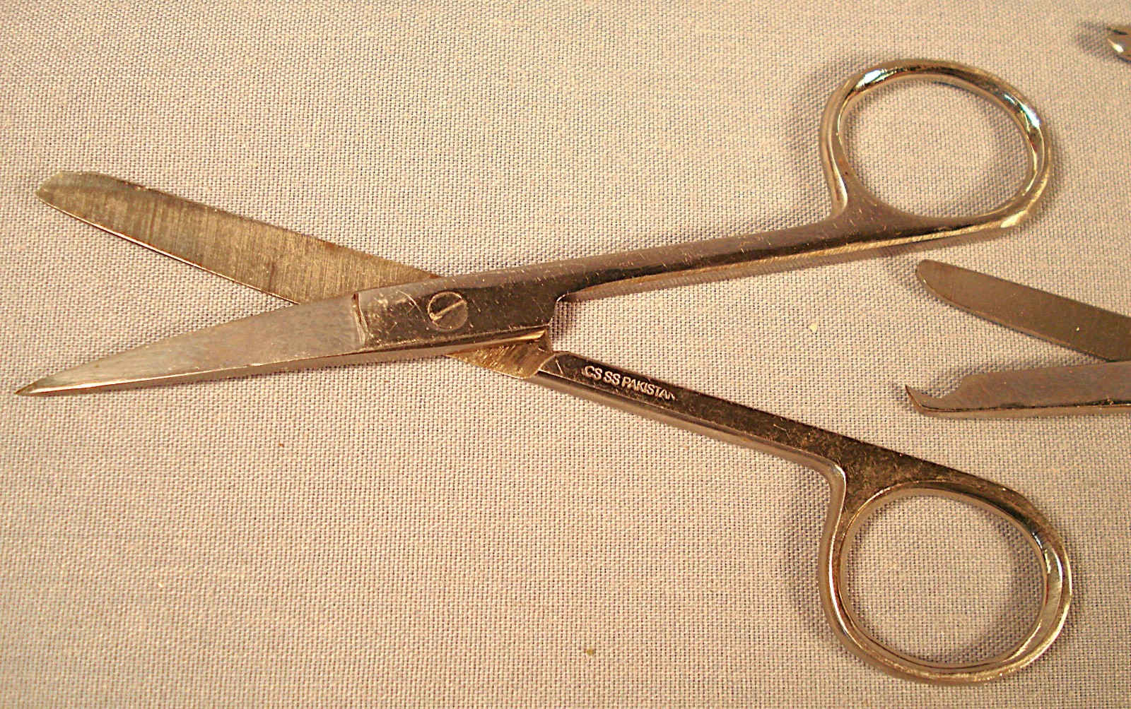 Seven Medical Tools; Tweezers, Scissors, etc.