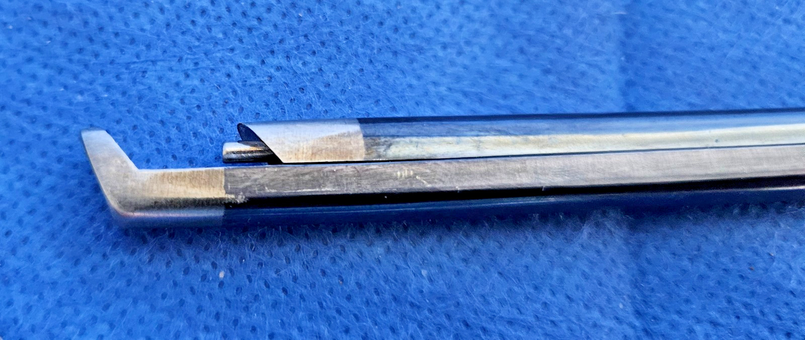 V.Mueller 5mm Kerrison Rongeur, L-1165, 40 degree, up with bone ejector.